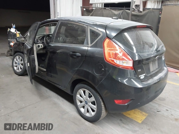 2013 Ford Fiesta SE with VIN 3FADP4EJ1DM107945, listed as a IAAI auction lot 42025064 with Not Provided miles and . Bid and sale history available at DreamBid. Image 3.