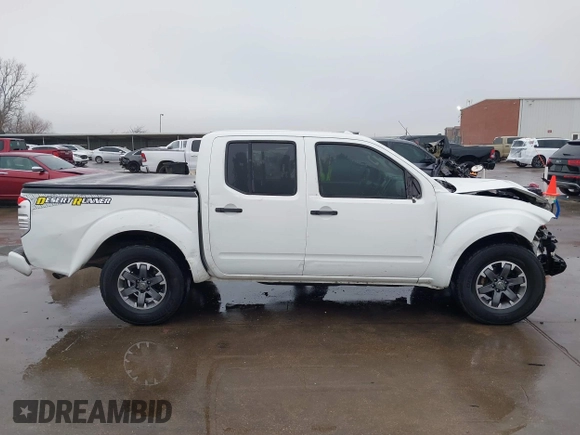 2014 Nissan Frontier SV with VIN 1N6AD0ER6EN751448, listed as a IAAI auction lot 41514633 with 238,204 mi miles and . Bid and sale history available at DreamBid. Image 13.