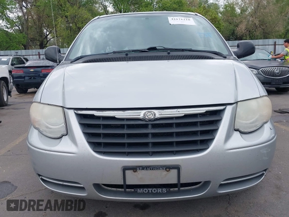 2007 Chrysler Town & Country with VIN 2A4GP44R27R191148, listed as a IAAI auction lot 42171218 with 150,670 mi miles and . Bid and sale history available at DreamBid. Image 13.