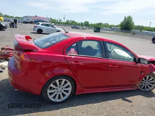 2008 Mitsubishi Lancer GTS z VIN JA3AU86U38U026810, wystawiony jako IAAI lot #42311094 z przebiegiem 108 484 mil mil oraz . Historia ofert i sprzedaży dostępna na DreamBid. Obrazek 14.