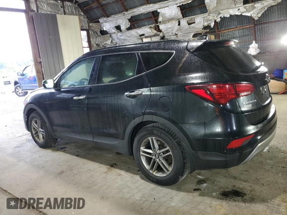 2017 Hyundai Santa Fe 2.4L with VIN 5NMZUDLB1HH013853, listed as a Copart auction lot 62577715 with 65,336 mi miles and Salvage title. Bid and sale history available at DreamBid. Image 2.