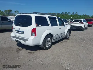 2012 Nissan Pathfinder SV with VIN 5N1AR1NN1CC616194, listed as a IAAI auction lot 40821219 with 104,698 mi miles. Bid and sale history available at carsss.com. Image 4.