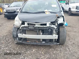 2013 Scion iQ with VIN JTNJJXB06DJ022801, listed as a IAAI auction lot 42152740 with Not provided miles and . Bid and sale history available at DreamBid. Image 6.