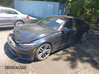2019 BMW 4 Series 440i xDrive with VIN WBA4J7C57KBM76622, listed as a IAAI auction lot 39738945 with 79,540 mi miles and . Bid and sale history available at carsss.com. Image 18.
