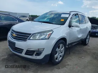 2017 Chevrolet Traverse Premier with VIN 1GNKVJKD8HJ135904, listed as a IAAI auction lot 42576473 with 92,526 mi miles and . Bid and sale history available at DreamBid. Image 2.