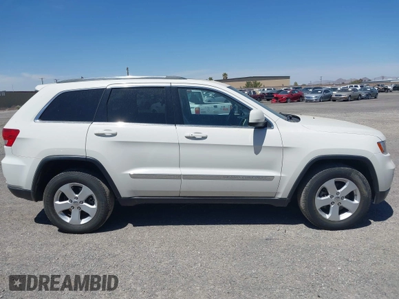 2012 Jeep Grand Cherokee Laredo with VIN 1C4RJEAG0CC210274, listed as a IAAI auction lot 42099944 with 177,527 mi miles. Bid and sale history available at carsss.com. Image 13.