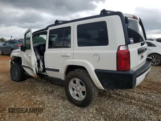 2008 Jeep Commander Sport with VIN 1J8HH48K68C115276, listed as a Copart auction lot 58859035 with 177,233 mi miles and Salvage title. Bid and sale history available at DreamBid. Image 2.