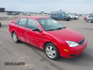 2007 Ford Focus S z VIN 1FAHP34N37W179508, wystawiony jako IAAI lot #41984406 z przebiegiem 145 616 mil mil oraz . Historia ofert i sprzedaży dostępna na DreamBid. Obrazek 1.