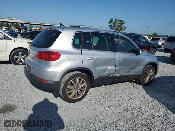 2012 Volkswagen Tiguan SE with VIN WVGAV7AX9CW607599, listed as a Copart auction lot 51214455 with 131,109 mi miles and Salvage Title. Bid and sale history available at DreamBid. Image 3.