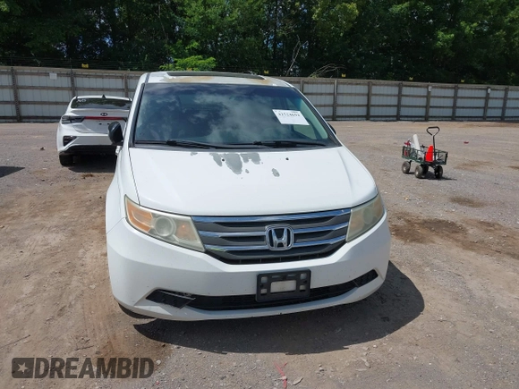 2012 Honda Odyssey EX-L with VIN 5FNRL5H62CB019238, listed as a IAAI auction lot 42524694 with 271,384 mi miles and . Bid and sale history available at DreamBid. Image 6.