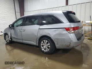 2016 Honda Odyssey SE with VIN 5FNRL5H31GB109718, listed as a Copart auction lot 54689915 with 48,933 mi miles and Salvage Title. Bid and sale history available at DreamBid. Image 2.