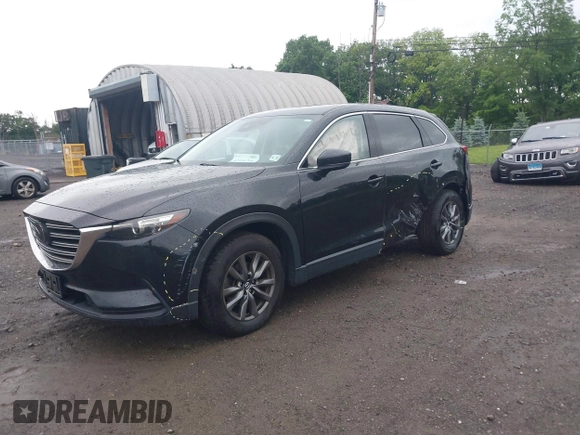 2020 Mazda CX-9 Touring with VIN JM3TCBCY5L0422262, listed as a IAAI auction lot 42456246 with 69,211 mi miles and . Bid and sale history available at DreamBid. Image 17.