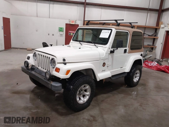 1997 Jeep Wrangler Sahara with VIN 1J4FY49S3VP529837, listed as a IAAI auction lot 41752978 with 138,024 mi miles. Bid and sale history available at carsss.com. Image 17.