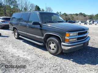 1999 Chevrolet Suburban with VIN 3GNEC16R0XG137834, listed as a IAAI auction lot 41853492 with 296,147 mi miles. Bid and sale history available at carsss.com. Image 1.