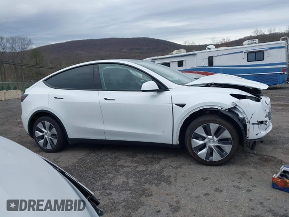 2023 Tesla Model Y Long Range with VIN 7SAYGDEEXPF684287, listed as a IAAI auction lot 41961230 with 45,080 mi miles and . Bid and sale history available at carsss.com. Image 13.