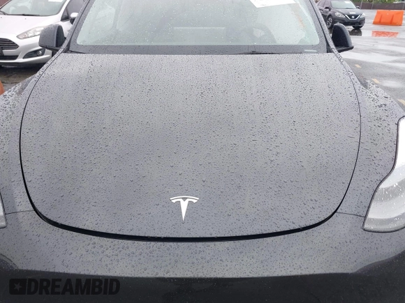 2024 Tesla Model Y Long Range with VIN 7SAYGDEE5RA241433, listed as a IAAI auction lot 41569277 with 7,490 mi miles. Bid and sale history available at carsss.com. Image 10.