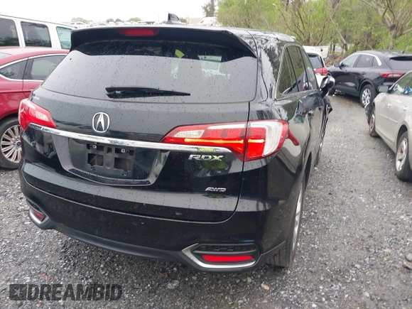 2016 Acura RDX with VIN 5J8TB4H33GL000260, listed as a IAAI auction lot 41965622 with 128,360 mi miles and . Bid and sale history available at DreamBid. Image 4.