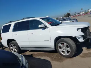 2015 Chevrolet Tahoe LT with VIN 1GNSCBKC3FR647295, listed as a IAAI auction lot 41848233 with 170,157 mi miles. Bid and sale history available at carsss.com. Image 14.