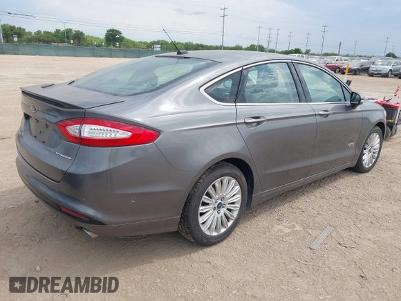 2014 Ford Fusion Titanium with VIN 3FA6P0SU0ER269411, listed as a IAAI auction lot 42163704 with 169,355 mi miles and . Bid and sale history available at DreamBid. Image 4.