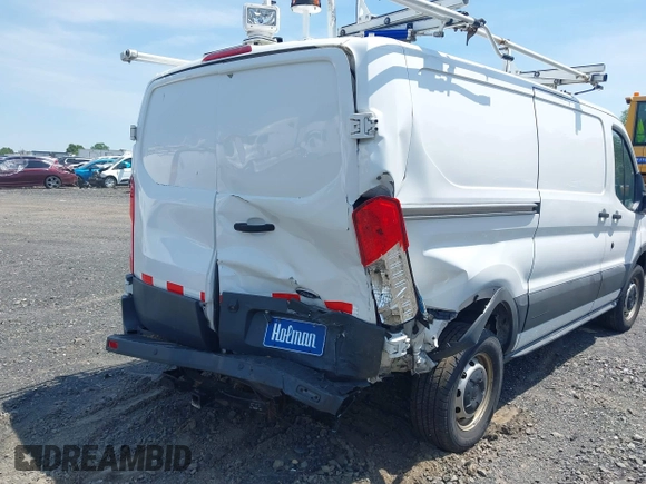 2016 Ford Transit Cargo z VIN 1FTYR1YM0GKB55605, wystawiony jako IAAI lot #42211489 z przebiegiem Nie podano mil oraz . Historia ofert i sprzedaży dostępna na DreamBid. Obrazek 6.
