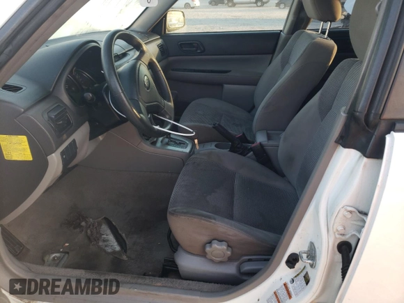 2006 Subaru Forester 2.5 X with VIN JF1SG636X6H742316, listed as a Copart auction lot 77882134 with 290,746 mi miles and Salvage Title. Bid and sale history available at carsss.com. Image 7.