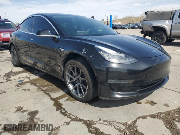 2020 Tesla Model 3 Long Range with VIN 5YJ3E1EB4LF599909, listed as a Copart auction lot 52435425 with 118,574 mi miles and Salvage Title. Bid and sale history available at DreamBid. Image 4.