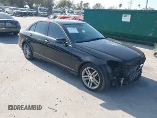 2014 Mercedes-Benz C-Class C 250 Sport with VIN WDDGF4HB3EG250671, listed as a IAAI auction lot 41607910 with 136,556 mi miles. Bid and sale history available at carsss.com. Image 1.