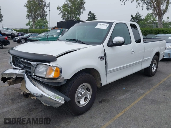 2000 Ford F-150 XL with VIN 1FTRX17L4YNA39407, listed as a IAAI auction lot 42141350 with 82,824 mi miles and . Bid and sale history available at DreamBid. Image 17.
