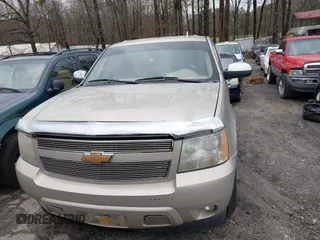 2010 Chevrolet Suburban LS with VIN 1GNUCHE03AR226103, listed as a IAAI auction lot 41729881 with 201,479 mi miles. Bid and sale history available at carsss.com. Image 12.