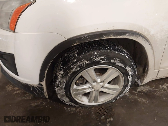 2015 Chevrolet Trax LT with VIN 3GNCJRSB7FL203418, listed as a IAAI auction lot 41572289 with 148,402 mi miles and . Bid and sale history available at DreamBid. Image 6.