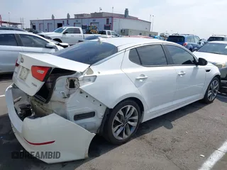 2015 Kia Optima SX with VIN 5XXGR4A73FG372592, listed as a IAAI auction lot 42575509 with 148,043 mi miles and . Bid and sale history available at DreamBid. Image 4.