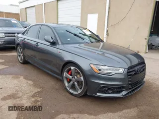 2015 Audi A6 3.0T Prestige with VIN WAUHGAFC7FN003900, listed as a IAAI auction lot 41057785 with 110,035 mi miles. Bid and sale history available at carsss.com. Image 1.