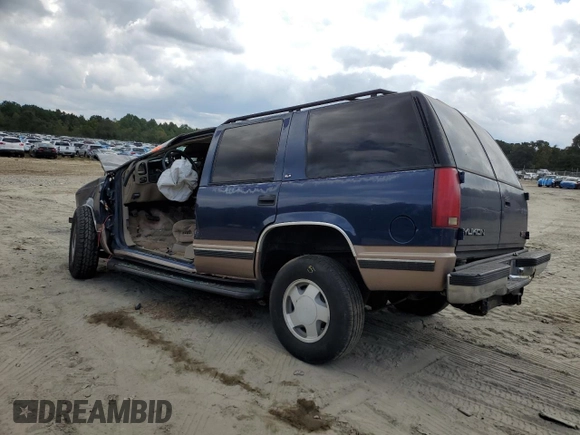 1998 GMC Yukon with VIN 1GKEK13R8WJ722890, listed as a Copart auction lot 72904114 with 243,711 mi miles and Salvage Title. Bid and sale history available at carsss.com. Image 2.