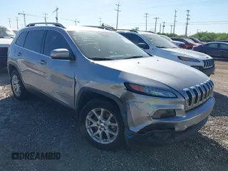 2017 Jeep Cherokee Latitude with VIN 1C4PJLCBXHW573751, listed as a IAAI auction lot 42220184 with 127,362 mi miles and . Bid and sale history available at DreamBid. Image 1.