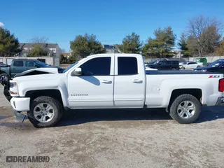 2018 Chevrolet Silverado 1500 LT with VIN 1GCVKREC5JZ350034, listed as a IAAI auction lot 41649277 with 112,673 mi miles. Bid and sale history available at carsss.com. Image 14.