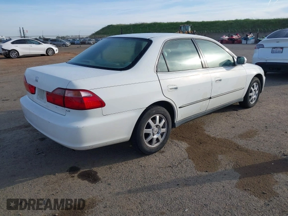 1999 Honda Accord LX with VIN JHMCG665XXC014090, listed as a IAAI auction lot 41765749 with 231,682 mi miles and . Bid and sale history available at DreamBid. Image 4.