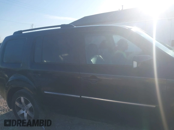 2013 Honda Pilot Touring with VIN 5FNYF4H96DB006582, listed as a IAAI auction lot 41722386 with 220,354 mi miles and . Bid and sale history available at carsss.com. Image 14.