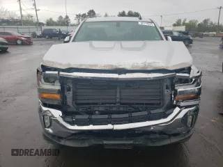 2018 Chevrolet Silverado 1500 LT with VIN 1GCVKREH8JZ102484, listed as a Copart auction lot 55114225 with 59,185 mi miles and Salvage Title. Bid and sale history available at DreamBid. Image 5.