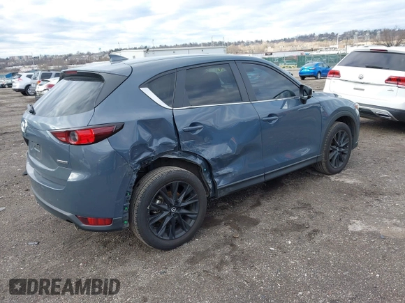 2021 Mazda CX-5 Touring with VIN JM3KFBCM5M0483547, listed as a IAAI auction lot 41683694 with 55,791 mi miles. Bid and sale history available at carsss.com. Image 4.