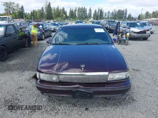 1994 Chevrolet Caprice LS z VIN 1G1BN52P2RR130218, wystawiony jako IAAI lot #42222080 z przebiegiem Nie podano mil oraz . Historia ofert i sprzedaży dostępna na DreamBid. Obrazek 13.