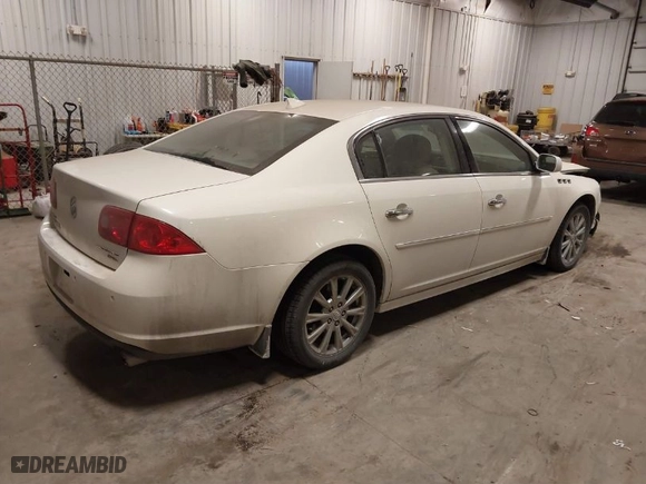 2010 Buick Lucerne CXL Premium with VIN 1G4HJ5EM9AU130504, listed as a IAAI auction lot 41328541 with 190,537 mi miles. Bid and sale history available at carsss.com. Image 4.