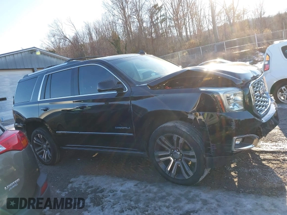 2019 GMC Yukon Denali with VIN 1GKS2CKJ2KR137664, listed as a IAAI auction lot 41335229 with 151,394 mi miles and . Bid and sale history available at DreamBid. Image 14.