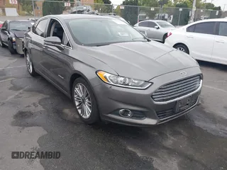 2014 Ford Fusion SE Hybrid with VIN 3FA6P0LU4ER298845, listed as a IAAI auction lot 42555117 with 233,765 mi miles and . Bid and sale history available at DreamBid. Image 1.