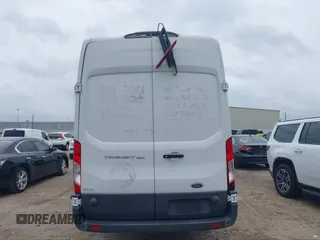 2018 Ford Transit z VIN 1FTBW3XMXJKB24221, wystawiony jako IAAI lot #42425978 z przebiegiem 77 666 mil mil oraz . Historia ofert i sprzedaży dostępna na DreamBid. Obrazek 17.