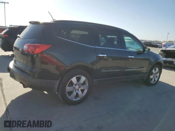2012 Chevrolet Traverse LTZ z VIN 1GNKRLED7CJ261692, wystawiony jako Copart lot #49294845 z przebiegiem 207 616 mil mil oraz Czysty tytuł • Clean title. Historia ofert i sprzedaży dostępna na DreamBid. Obrazek 3.