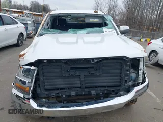 2018 Chevrolet Silverado 1500 LT with VIN 1GCUKREC0JF208509, listed as a IAAI auction lot 41794616 with 96,962 mi miles and . Bid and sale history available at DreamBid. Image 6.