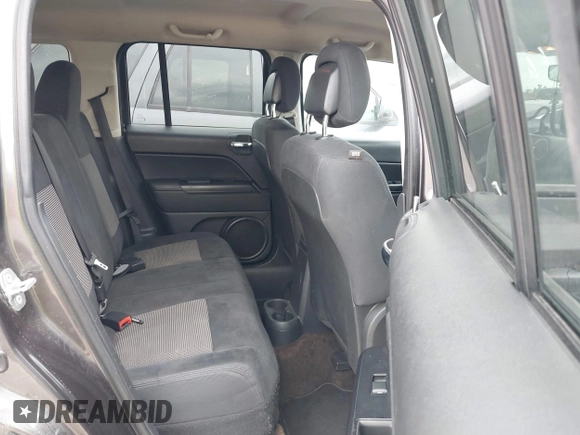 2014 Jeep Patriot Latitude with VIN 1C4NJRFB3ED810819, listed as a IAAI auction lot 41994129 with 145,733 mi miles and . Bid and sale history available at carsss.com. Image 8.
