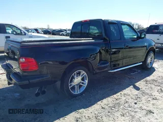 2000 Ford F-150 XL z VIN 2FTRX07L5YCB11117, wystawiony jako IAAI lot #41649583 z przebiegiem 240 557 mil mil oraz . Historia ofert i sprzedaży dostępna na DreamBid. Obrazek 4.