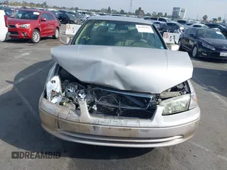 2001 Toyota Camry CE z VIN 4T1BG22K51U083381, wystawiony jako IAAI lot #41482936 z przebiegiem 84 219 mil mil oraz . Historia ofert i sprzedaży dostępna na DreamBid. Obrazek 12.