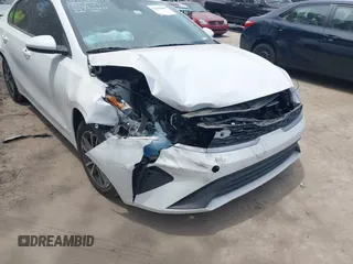 2024 Kia Forte LXS with VIN 3KPF24AD9RE724254, listed as a IAAI auction lot 42101601 with 37,904 mi miles and . Bid and sale history available at DreamBid. Image 6.